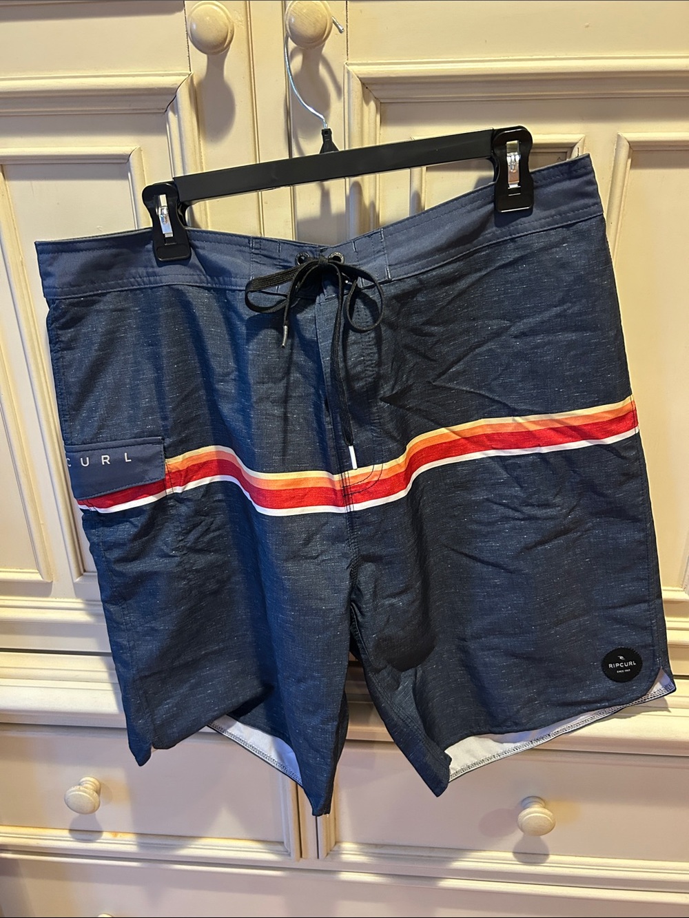 Rip Curl Navy Boardshorts with Red, Orange and White Stripe